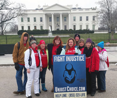 Chapter directors Lauren Handy (Wash, DC) and Melissa Stiwinter (Cullowhee, NC) rally with other pro-lifers before the White House in January for the March for Life.